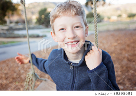 kid at swings 39298691