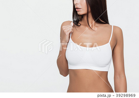 Young beautiful girl shows her gorgeous Breasts Young beautiful girl shows her gorgeous Breasts 39298969