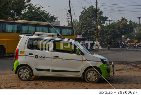 Ola car on street in Agra, India Ola car on street in Agra, India 39300637