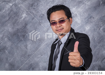 business man in suit with thumb up business man in suit with thumb up 39303154