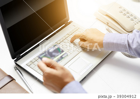 businessman do online shopping with credit card businessman do online shopping with credit card 39304912