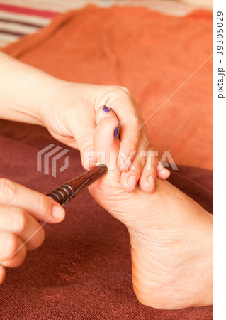 reflexology foot massage by wood stick reflexology foot massage by wood stick 39305029