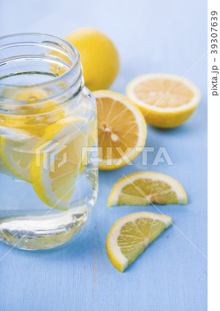 Refreshing ice cold water with lemon Refreshing ice cold water with lemon 39307639
