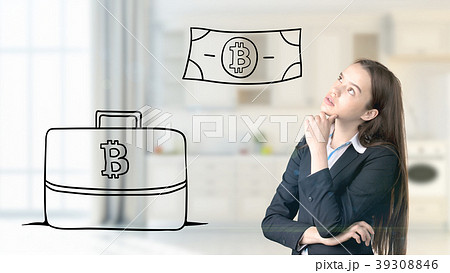 Surprised smiling young woman wearing a suit and 39308846