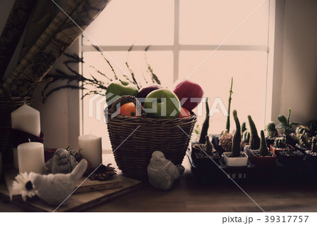 Artificial Fruits in a basket on wood table. Artificial Fruits in a basket on wood table. 39317757