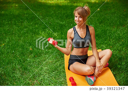 girl in the park and engaged in various exercises girl in the park and engaged in various exercises 39321347