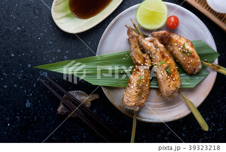 Grilled chicken wings with teriyaki sauce. Grilled chicken wings with teriyaki sauce. 39323218