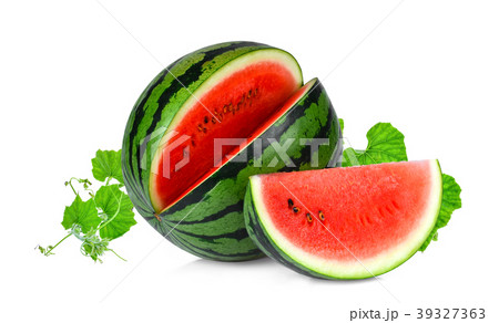 whole and slices watermelon with green leaves  39327363