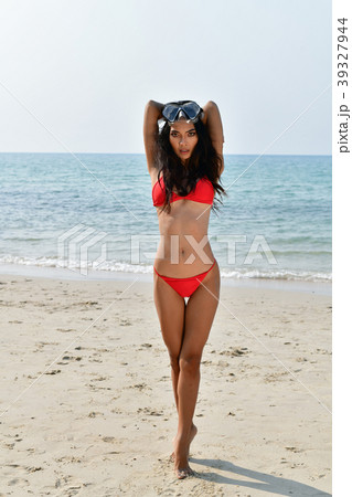 Sexy girl concept in swimsuit. Beautiful woman wearing a swimsui Sexy girl concept in swimsuit. Beautiful woman wearing a swimsui 39327944