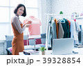 Online women sellers are selling clothes.  39328854