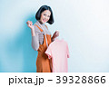 Asian girl designer is showing off the shirt  39328866