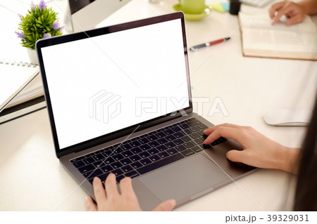 Woman working laptop at workplace Woman working laptop at workplace 39329031
