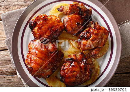 Hawaiian chicken huli huli with pineapple close-up Hawaiian chicken huli huli with pineapple close-up 39329705