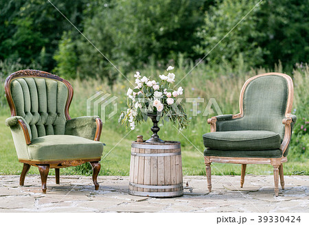 Vintage wood chairs and table with flower 39330424