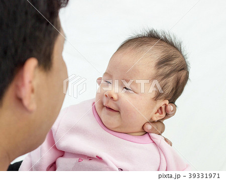 Happy Asian Father Look with love. newborn baby daughter, dad Happy Asian Father Look with love. newborn baby daughter, dad 39331971
