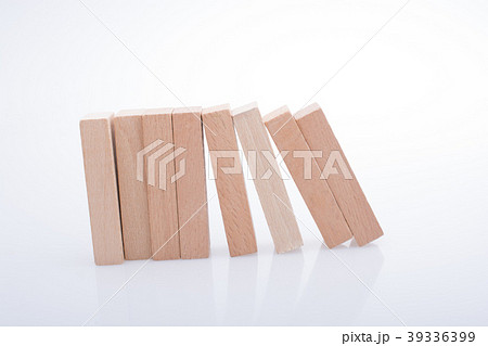 Wooden domino blocks on white background 39336399