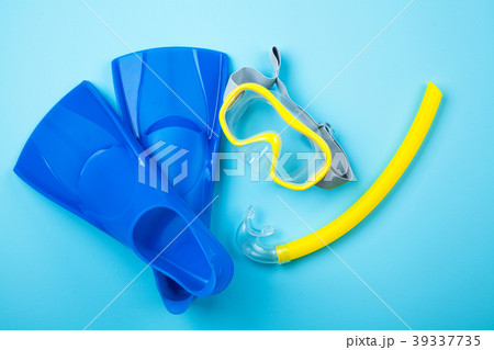 Blue flippers on color background Blue flippers on color background 39337735