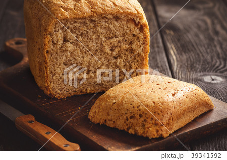 Loaf of homemade wholegrain bread. Loaf of homemade wholegrain bread. 39341592