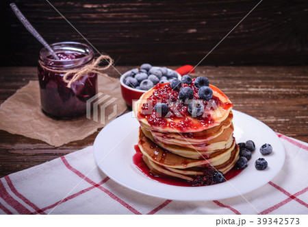 American pancakes with jam and blueberries 39342573