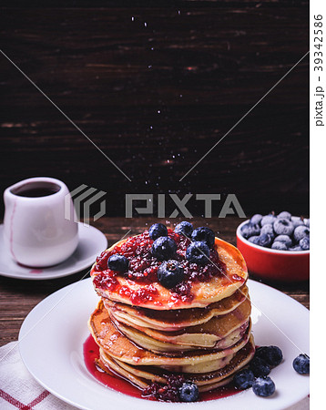 American pancakes with jam and blueberries American pancakes with jam and blueberries 39342586