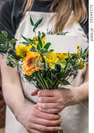 Florist holding bouquet beautiful flowers 39344775