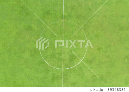 Aerial at the center of the green football field 39348385
