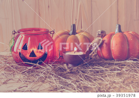 Halloween pumpkin and ornament on wood table. Halloween pumpkin and ornament on wood table. 39351978