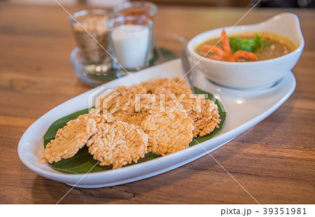 Crispy rice cake and peanut pork sauce. Crispy rice cake and peanut pork sauce. 39351981