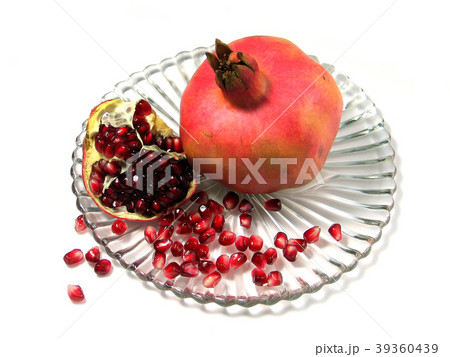 Pomegranate on the glass plate Pomegranate on the glass plate 39360439