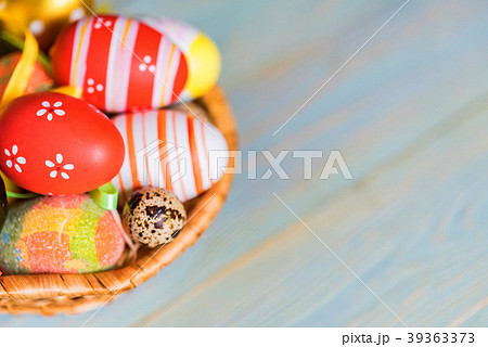 Several colorful Easter eggs in basket close Several colorful Easter eggs in basket close 39363373
