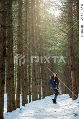 Young hipster woman in winter forest having fun Young hipster woman in winter forest having fun 39370858