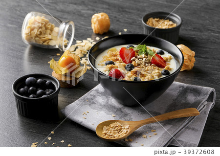 Muesli on bowl for breafast Muesli on bowl for breafast 39372608