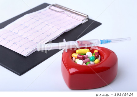 RX prescription, Red heart, asorted pils and a 39373424