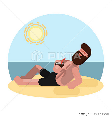 Man laying on beach with cocktail 39373596