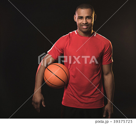 Young Athletic Man In Red T Shirtの写真素材