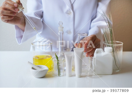 scientist hand pour,drop oil or serum laboratory scientist hand pour,drop oil or serum laboratory 39377809