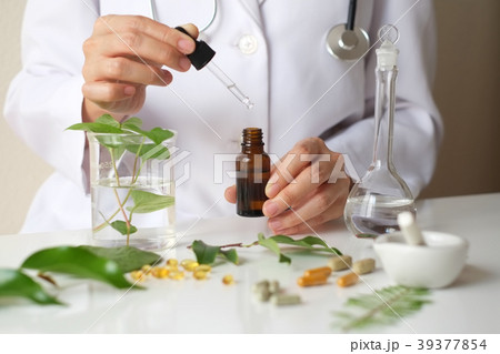 scientist hand pour,drop oil or serum laboratory 39377854