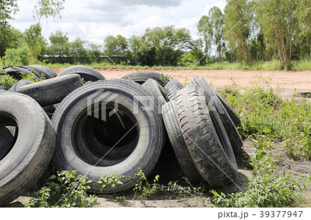 Old tire wheels. 39377947