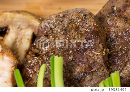 Mixed grilled meats platter closeup. Mixed grilled meats platter closeup. 39381495