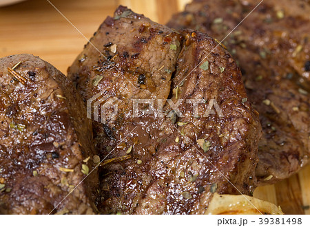 Mixed grilled meats platter closeup. Mixed grilled meats platter closeup. 39381498