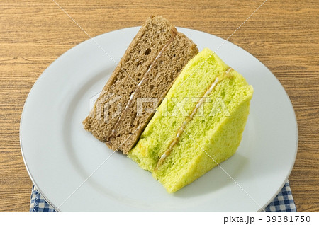 Plate of Triangle Pandan and Coffee Chiffon Cake Plate of Triangle Pandan and Coffee Chiffon Cake 39381750
