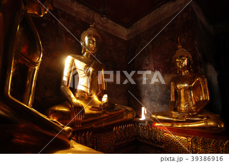 Gold classic buddha statue in Suthat temple 39386916