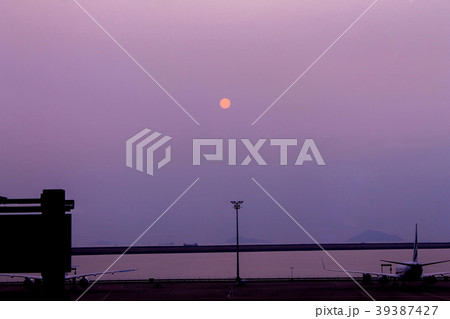 sunrise at Macau international airport with ocean sunrise at Macau international airport with ocean 39387427