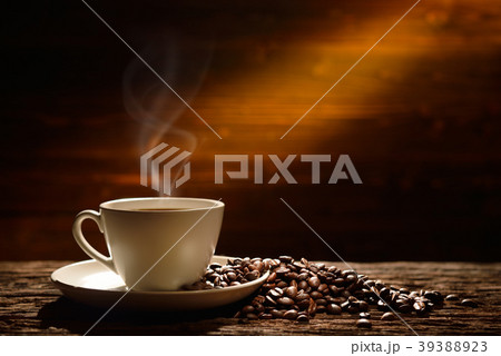 Coffee cup and coffee beans 39388923