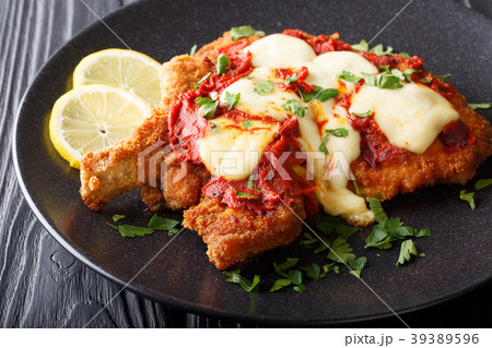 La milanesa napolitana - homemade veal cutlet 39389596