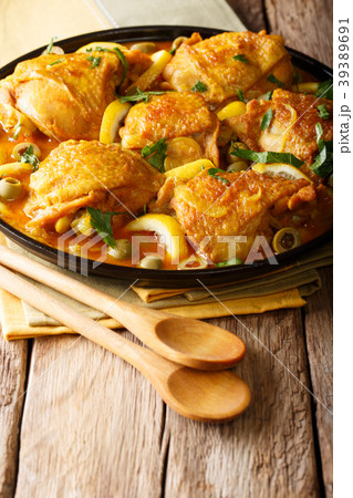 Spicy chicken stew with salted lemons, onions Spicy chicken stew with salted lemons, onions 39389691
