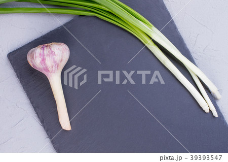 Fresh garden onion and garlic. 39393547