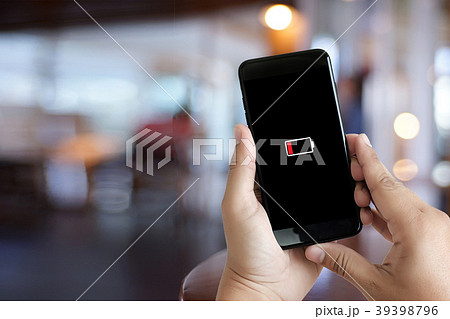 Close up man hands using smart phone battery Close up man hands using smart phone battery 39398796