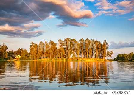 Beautiful sunset on forest lake Beautiful sunset on forest lake 39398854