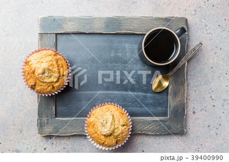Shot with muffin and coffee cup 39400990